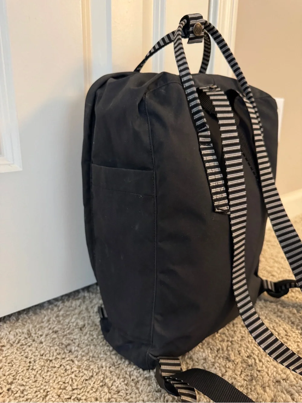 Fjallraven Kanken Backpack in Black with Red Logo